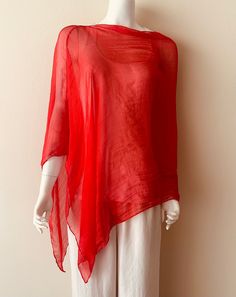 Red see through lightweight summer poncho.  This multifunctional season less poncho is great as an outfit enhancer  and can also be worn over your swimsuit as a beach cover up.   It can be draped with the seam on the shoulders, front, or back to create different looks. One size fits most Polyester Chiffon CLICK LINK BELOW FOR MORE OPTIONS https://www.etsy.com/shop/2WeeksOff One Size Wrap Top For Beach, Casual Red Cover-up For Beach Season, Red Summer Tunic Top, Oversized Batwing Sleeve Summer Cover-up, Spring Beach Cover-up Poncho Shawl, Spring Beach Poncho Shawl Cover-up, Spring Beach Poncho Shawl, Spring Beach Shawl Poncho, Red Cover-up Beachwear For Summer