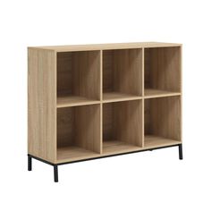 a wooden shelf with four compartments and black legs