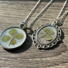 These elegant lucky charmed necklaces will for sure give you the best of luck :) Not only are these necklaces an elegant wear, but they're also as lucky as can be making a beautifully unique look for any occasion!  Genuine and handpicked from Mercersburg, Pennsylvania. Painted a natural green, your fern/four leaf clover will maintain its natural vibrant green color and texture lasting a lifetime. Gently placed inside for the best protection and look. Each charm has a silver/bronze chain.  Pendant Tray Material: Metal Alloy Pendant Tray Color: Silver or Bronze Necklace/Chain Length: 20inch The silver/bronze pendant tray bezels beautifully surrounds the piece inside, measuring L/W - 1 1/2 x 1 inches. The four leaf/fern is preserved between silver/bronze metal alloy and high quality epoxy res 5 Leaf Clover, Fern Necklace, Elegant Wear, Lucky Charm Necklace, Victorian Necklace, Clover Pendant, Bronze Necklace, Plate Necklace, Necklace Chain Lengths