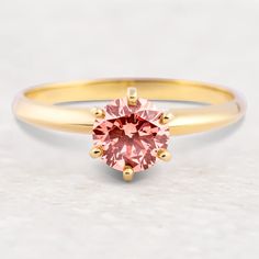 You're a real showstopper, doll: beauty, smarts, and sass. Whether you're designing the perfect party, creating an incredible story or finding the perfect gift, there is love in everything you do. May this pink light shine as bright as you and remind you that you are unstoppable! Solid 14K Gold or Platinum .9 ct. Solitaire Round Lab Grown Pink Diamond 2mm Wide Solitaire Design in Comfort Fit with Polished Finish Sweetheart ring box included Available in Sizes 4-9 Doll Beauty, Pink Diamond Ring, The Rachel, Silicon Bands, Pink Light, Pink Diamond, Perfect Party, Ring Box, Lab Grown