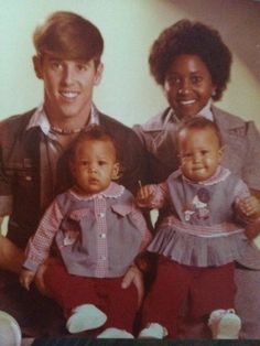 the family is posing for a photo on their twitter account, which features an image of them