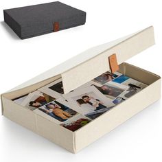 an open box with photos in it