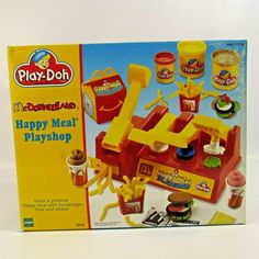 the play doh mcdonalds happy meal playshop is in its original box with instructions