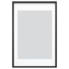 a black frame hanging on the wall with a white and black border in front of it