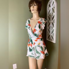 Pretty Little Thing Tropical Romper Size 6 Brand New With Tags Casual V-neck Jumpsuits And Rompers With Tropical Print, Trendy White Beach Jumpsuits And Rompers, White Casual Beach Jumpsuits And Rompers, Trendy White Jumpsuits And Rompers For Beach, White Casual Jumpsuits And Rompers For Beach, Trendy White Jumpsuit For Beach, Casual White Jumpsuits And Rompers For The Beach, Summer Printed Jumpsuits And Rompers For Brunch, White Floral Print Jumpsuits And Rompers For Beach Season