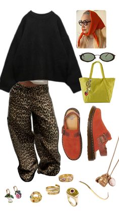 a woman wearing leopard print pants, black sweater and orange shoes with accessories around her