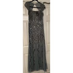 Purchased From A Poshmark Seller But The Event I Was Going To Got Canceled. Elegant Gown With Beautiful Bead Work Silver Sequined Maxi Evening Dress, Silver Sequined Evening Maxi Dress, Glamorous Silver Gown For Festive Season, Silver Glamorous Gown For Festive Season, Glamorous Silver Festive Gown, Silver Glamorous Festive Gown, Festive Silver Glamorous Gown, Silver Maxi Length Sequin Dress For Evening, Silver Maxi Length Gala Dress