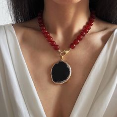 R E D ∙ C A R N E L I A N ∙ N E C K L A CE 💎Features: * Material: Natural Red Carnelian Beads,Natural Black Agate, Brass Clasp-Gold Plated, Tarnish Free * Gemstone Grade: AAAAAAA, High Quality genuine gemstone. * Beads Size: 12mm large size * Pendant Size:  * Color: Rich, lustrous red beads, Black Agate Pendant, 14K Gold color for hardware * Detachable Pendant for versatile styling: Wear it for bold or remove for minimalist elegance. Switch effortlessly between 2 styles. * Length: 16 to 26 inch Luxury Elegant Carnelian Beaded Necklaces, Red Agate Jewelry With Natural Stones, Red Beaded Agate Jewelry, Red Beaded Necklaces With Natural Stones, Red Agate Beaded Jewelry, Red Agate Gemstone Necklace, Red Agate Beaded Necklaces With Round Beads, Red Agate Beaded Necklace With Gemstone Beads, Red Agate Gemstone Beaded Necklace