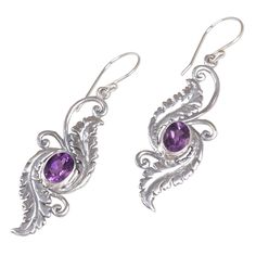 Artisan Wirabhuwana crafts these elegant earrings with a modern Balinese flair, helping to add charm and mystery to any look. Radiant amid sterling silver foliage, these 3.5-carat amethyst dangle earrings cast a spell of beauty. Sterling silver, amethyst Hook earrings High polish finish Handmade in & fairly traded from Indonesia Sea Themed Earrings, Morning Garden, Cast A Spell, Ribbon Jewelry, Jewelry Workshop, Printed Jewelry, Sterling Silver Dangle Earrings, Amethyst Earrings, Balinese