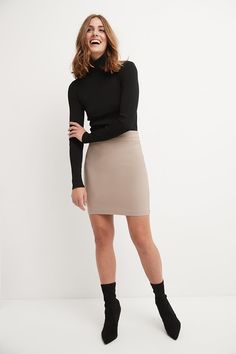 You know that some things never go out of fashion. Whether it’s representing your company at that big event or attending your friend’s birthday party, you can trust this classic, above-the-knee pencil skirt. Its soft waistband offers the perfect support for a slim silhouette, making you comfortable for long hours. As you take prospects through a demo or greet old friends for a brunch, this versatile skirt pairs easily with any sophisticated tops of yours. Made with a blend of rayon, nylon, and s Trendy Fitted Mini Skirt For Date Night, Midi Pencil Skirt For Night Out, Fitted Midi Pencil Skirt For Night Out, Trendy Fitted Skirt For Formal Occasions, Trendy Fitted Skirt For Date Night, Trendy Fitted Formal Skirt, Fitted Short Skirt For Date Night, Bodycon Mini Pencil Skirt For Night Out, Fitted Mini Pencil Skirt For Night Out