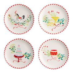 four plates with designs on them sitting in front of a white background and one has a horse