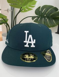 • Green fitted hat • Grey undervisor • New Era 59Fifty • Low-profile silhouette • Embroidered Dodgers logo at center-front • Embroidered Aimé Leon Dore logo on side panel • 100% Polyester • Made in China New Era size guide below Runs large. Recommend sizing down for your usual fit. SIZE 7 7⅛ 7¼ 7⅜ 7½ 7⅝ 7¾ 7⅞ CIRC (IN) 22 22⅜ 22¾ 23⅛ 23½ 23⅞ 24¼ 24⅝ CIRC (CM) 55.8 56.8 57.7 58.7 59.6 60.6 61.5 62.5 La Dodgers Hat, Dodgers Hat, Dodger Hats, Dodgers Logo, Leon Dore, Profile Silhouette, Aime Leon Dore, New Era 59fifty, Fitted Hat