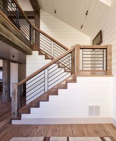 the stairs are made of wood and metal