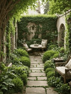 an outdoor patio with chairs and tables surrounded by greenery on either side of the walkway