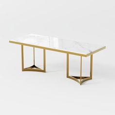 a white marble table with gold legs and a metal frame on the bottom, against a white background