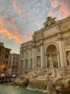 the trellotto fountain at sunset in rome, italy