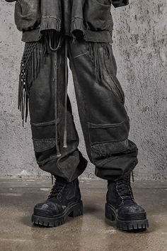 Embrace the fusion of street style and casual comfort with the Distressed Demon Clad Deconstructed Pants. These pants feature a unique deconstructed patchwork design, with a standout mesh fabric panel at the knees that adds both texture and visual interest. The distressed detailing at the seams enhances the worn-in, vintage vibe, while the dirty fit and overall aged appearance contribute to their rugged appeal. Crafted from premium fabric, these slightly oversized pants ensure both comfort and d Winter Patchwork Straight Leg Bottoms, Alternative Ripped Bottoms For Streetwear, Alternative Style Ripped Bottoms For Streetwear, Baggy Patchwork Bottoms For Streetwear, Winter Grunge Distressed Bottoms, Baggy Ripped Pants For Fall, Edgy Patchwork Cotton Bottoms, Alternative Style Ripped Straight Leg Bottoms, Straight Leg Bottoms With Patches For Streetwear