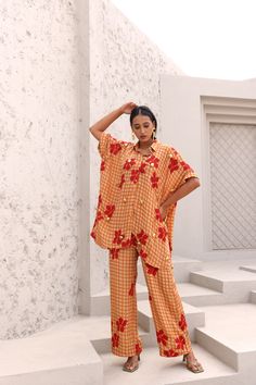 Fresh, modern, and perfect for everyday wear, you will never be bored with your wardrobe again. Our block-piece co-ord set is a wardrobe staple you can’t miss out on. Hand block printed in Jaipur, Rajasthan.Made in natural crepe. Kaftan Shirt features a front placket, shirt highlighted with gold embellishment. Pants feature an elasticated back waist, side zipper, and front hip pockets. Styling Tip- Pair it with a jute bag and dainty jewelry for your next brunch date. Natural Crepe 1 pant and 1 b Co Ords Outfits Indian, Sougat Paul, Kaftan Shirt, Co Ords Outfits, Jute Bag, Gold Embellishment, Jaipur Rajasthan, Jute Bags, Co Ord Set