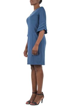 Tiered sleeves accent a sheath dress for a tasteful, elegant style. . Jewel neck. 3/4 length tiered sleeves. Back hidden zip closure. Seam detailing. Solid. Unlined. Approx. 39" length (size S). Imported Dry clean 94% polyester, 6% spandex Tiered Sleeve, Midi Dress With Sleeves, Jewel Neck, Elegant Style, Sheath Dress, Shift Dress, Casual Dress, Midi Dress, Dry Clean