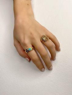 Two different handmade rings with base in gold color. Both of them have unique shape and different designs. The first one is a gold signet ring with a turquoise enamel stone, and the second one is a gold evil eye ring. Both of them are slightly adjustable. In Christina Christi Jewels store you can see a lot of designs in Women's Rings. You can have them in 2-4 Days with DHL EXPRESS SHIPPING MATERIALS - Gold Plated 24k Pewter. DIMENSIONS - Rings Diameter is 17mm (0.67'') - US 7 - Slightly Adjusta Adjustable Gold Turquoise Ring Fine Jewelry, Adjustable Gold Turquoise Ring In Fine Jewelry Style, Handmade Gold Turquoise Ring For Anniversary, Gold Turquoise Open Ring As A Gift, Unique Gold Turquoise Ring Gift, Heirloom Style Gold Turquoise Ring As Gift, Elegant Handmade Gold Turquoise Ring, Unique Handmade Gold Turquoise Ring, Handmade Gold Turquoise Ring