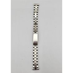 Vintage fold over snap close/deployment clasp stainless steel unisex watch band. Replacement band. Features: * Lug Width 13.3 mm * Vintage, Fold Over Snap Closure, Deployment Clasp * Made in USA Measurements: Band Length Closed 5.75 in Band Width 0.375 in Lug Width 0.523 in Condition: Pre-Owned Good Finish is in excellent condition. Snap closure is secure.  F102222 Silver Classic Rectangular Watch Bands, Classic Stainless Steel Bracelet Strap Watch Accessories, Classic Stainless Steel Bracelet Strap For Watch, Formal Stainless Steel Watch Accessories With Bracelet Strap, Adjustable Stainless Steel Watch Bands For Formal Occasions, Formal Stainless Steel Watch With Bracelet Strap, Formal Adjustable Stainless Steel Watch Bands, Classic Metal Watch Accessories With Bracelet Strap, Classic Stainless Steel Bracelet Strap Watch Bands