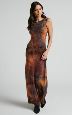 Get ready to turn heads in the Amayra Midi Dress! This playful and flirty bodycon dress features a high neck and sleeveless design, perfect for those warm summer days. The trendy brown tie-dye print adds a touch of boho-chic to this classic silhouette. Whether you're heading out for brunch or a casual day at the beach, this dress is sure to become your new go-to. Pair it with sandals or sneakers for an effortlessly stylish look that will keep you looking fabulous all day long.Product Details:Boa Fitted Tie Dye Maxi Dress, Brown Stretch Summer Maxi Dress, Fitted Tie-dye Maxi Dress, Rust Fitted Dress, Rust Fitted Summer Dress, Fitted Rust Summer Dress, Fitted Tie Dye Maxi Dress For Beach, Fitted Tie-dye Maxi Dress For The Beach, Brown Tie Dye