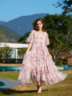 Pink Feminine Bridesmaid Midi Dress With Ruffles, Feminine Maxi Chiffon Dress With Ruffles, Spring Tiered Bridesmaid Dresses, Spring Bridesmaid Tiered Dresses, Feminine Spring Chiffon Prom Dress, Chiffon Ruffle Midi Dress For Wedding Guests, Chiffon Midi Dress With Ruffles For Wedding Guests, Chiffon Midi Dress With Ruffles For Wedding, Feminine Spring Chiffon Dress For Prom