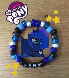 the pony bracelet has been made with blue and white beads