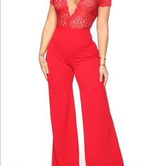 Red Lace Jumpsuit Low Cut Wide Leg Top Half Is See Through Never Worn Red Fitted V-neck Bodysuit, Fitted Red V-neck Bodysuit, Short Sleeve Stretch Jumpsuits And Rompers For Party, Stretch Short Sleeve Jumpsuits And Rompers For Party, Party Stretch Short Sleeve Jumpsuits And Rompers, Party Stretch Jumpsuits And Rompers With Short Sleeve, Red V-neck Bodysuit For Spring, Spring Red V-neck Bodysuit, Party Bodysuit With Short Sleeves