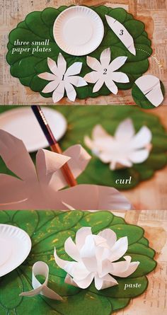 paper flowers are cut out and placed on leaves