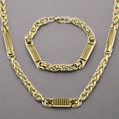 Our Arco Collection is a visual feast for the eyes. A powerful combination of premium grade 316L solid stainless steel fused with luxurious 18k Yellow Gold. Chain link sections interspersed with multi directional arched links give a true designer look. Necklace measures 24" and bracelet fits up to a 8.5" wrist. Each piece dispatches in one of our magnificent presentation cases. Luxury Stainless Steel Chain Bracelet With Rectangular Links, Gold Stainless Steel Jewelry With Rectangular Links, Modern Stainless Steel Jewelry With Rectangular Links, Rectangular Links Jewelry In Yellow Gold Stainless Steel, Stainless Steel Chain Link Jewelry With Hooks, Formal Stainless Steel Jewelry With Rectangular Links, Swag Men, Grown Man, Yellow Gold Chain