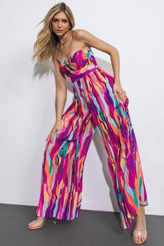 A printed woven jumpsuit featuring strapless twisted bodice with center cut out, pleated pant and smocked back bodice Details: Self : 100% One Thing At A Time, Pleated Pant, Resort Dresses, Strapless Jumpsuit, Stunning Outfits, Dress Satin, Pleated Pants, Trending Dresses, Wedding Party Dresses