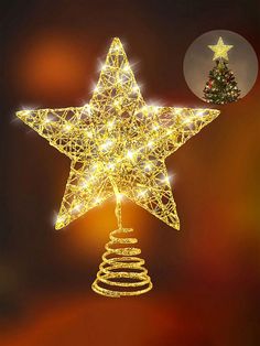 a christmas ornament with a star on top and a tree in the background