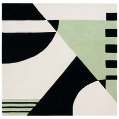 an abstract rug with black, white and green colors