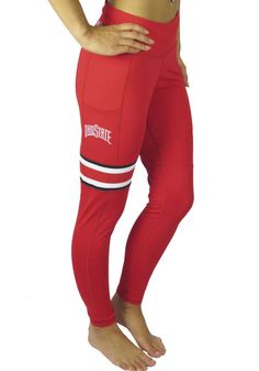 You'll be ready for your workout in these Ohio State Buckeyes Womens Red Pants. With a screen print team logo and name down left leg, these The Ohio State University Athletic Pants are a great way to show your Buckeyes pride at the gym! Dual blend fabrication, Polyester for wicking, Spandex for stretch, High rise, Full length, 90% Polyester - 10% Spandex, 4 Red Elastane Activewear For Gym, Red Elastane Activewear For Sports, High Stretch Sportswear Bottoms For Sports Events, Stretch Sportswear Bottoms For Sports Events, Red Sportswear Bottoms For Gym, Red Activewear With 4-way Stretch For Training, Red 4-way Stretch Activewear For Training, Red 4-way Stretch Activewear For Sports, Stretch Moisture-wicking Bottoms For Sports Events