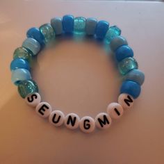 handmade kandi bracelet for stray kids seungmin ! please message us with any questions or concerns you may have. Kpop Style Blue Beaded Bracelets As Gift, Blue Kpop Style Beaded Bracelet Gift, Stay Bracelet, Pulseras Ideas, Bracelets Kandi, Pulseras Kandi, Kpop Earrings, Kandi Bracelets, Bracelets Design