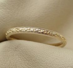 a wedding ring with filigrees on it