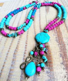 Bohemian tassel beaded necklace made with turquoise beads, turquoise  chips, pink lava beads, hand made beaded tasell,  brass charms. One-of-a-kind colorful bohochic long necklace You can wear on any ocasion. Go well specially in summer time. Hand made tassel make this item a little boho - hippy. Summer and turquoise go great together. It is wearable of course all year round. I'm sure you'll love to wear this unique peace of jewerly. Dimensions: -boho necklace is 55 cm long(with pendant) Thank y Affordable Bohemian Turquoise Necklace With Beaded Chain, Bohemian Beaded Dangle Tassel Necklace, Turquoise Beaded Jewelry For Festival, Adjustable Blue Bohemian Tassel Necklace, Turquoise Jewelry With 8mm Beads For Festival, Bohemian Beaded Turquoise Dangle Necklace, Bohemian Tassel Necklace With Colorful Beads For Beach, Bohemian Turquoise Beaded Dangle Necklaces, Bohemian Turquoise Dangle Beaded Necklaces