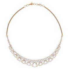 An absolute beauty! This 18 karat rose gold choker necklace features 286 sparkling white diamonds weighing a total of approximately 3.72 carats. The unique design features an X cross pattern design with multiple tear drop designs suspended from the bottom, all encrusted with perfectly well matched natural diamonds averaging H color and VS clarity. Measuring just under 16" long, the necklace features multiple loops so it can be worn at a variety of lengths. Dressed up or down, this one is sure to turn heads! Rose Gold Choker Necklace, Rose Gold Choker, Diamond Choker Necklace, Diamond Choker, Gold Choker Necklace, Cross Patterns, Gold Choker, Stone Design, Drops Design