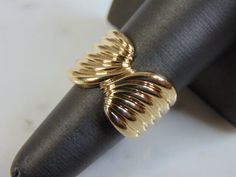 "A WOMENS VINTAGE ESTATE 14K GOLD RING.  RING WEIGHS 9.3g, AND IS A SIZE 7.25.  WIDTH OF THE RING IS 1/2\".  WOULD MAKE A LOVELY GIFT FOR THAT SOMEONE SPECIAL.  BE SURE TO CHECK OUT SOME OF MY OTHER GREAT ITEMS UP FOR SALE. THANK YOU. IF THERE ARE ANY ISSUES PLEASE CONTACT US, WE'RE ALWAYS HAPPY TO TRY TO HELP YOU OUT AS BEST AS WE CAN." Silver Turtle Ring, Arrow Ring, Yellow Gold Diamond Ring, Ringe Gold, Onyx Necklace, Gold Band Ring, Sapphire Diamond Ring, Fancy Jewelry, Cz Ring