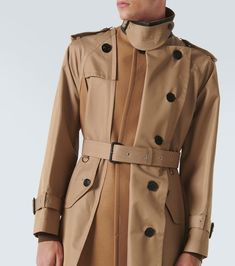 Find SACAI Gabardine Trench Coat on Editorialist. Material: 63% cotton, 37% polyester. Care instructions: dry clean. Made in Japan. Designer color name: Beige. Material II: 100% wool. Lining: 100% cupro. Closure: buttoned front. Pockets: buttoned pockets. Detachable belt. Drawstring Coat, Blue Trench Coat, Belted Coat, Green Coat, Parka Coat, Hooded Coat, Black Coat, Mens Coats, Made In Japan