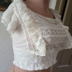 Nwt Stunning And Rare.. Would Look Hot W Trousers I Ship Same Day Fitted Ruffle Crochet Top, White Stretch Top With Lace Trim, White Stretch Tops With Lace Trim, Feminine Fitted Cotton Lace Top, Fitted Short Sleeve Top With Delicate Lace, Feminine Lace Trim Crop Top, Fitted Tops With Delicate Lace And Short Sleeves, White Ruffles Crop Top, Spring Stretch Off White Tops