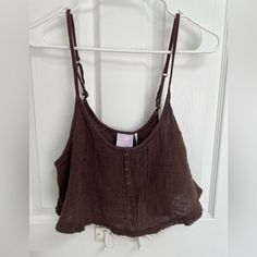 Out From Under Urban Outfitters Brown Cropped Cami 100% Cotton Women’s Size L Nwt Approximate Measurements In Photos Color May Vary Slightly Based On Screen Settings And Lighting Affordable Basic Tops By Urban Outfitters, Cheap Stretch Crop Top By Urban Outfitters, Casual Daywear Camisole With Adjustable Straps, Casual Camisole With Adjustable Straps For Daywear, Brown Summer Tank Top With Adjustable Straps, Brown Camisole Crop Top For Summer, Casual Tank Top With Adjustable Straps For Daywear, Cropped Cotton Camisole For Vacation, Casual Tops With Adjustable Straps For Daywear