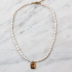 Freshwater pearl with 18K gold pendant. It's a classic look with a nice weight to layer with dainty chains. 17" with the extension chain. Waterproof 18K plated Jasper Necklace, Classic Looks, Gold Pendant, Fresh Water, Freshwater Pearls, 18k Gold, Chain, Pendant, Gold