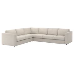 a white sectional couch with the corner section facing off to the side, on a white background