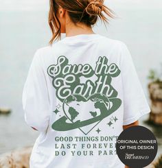 Celebrate our planet with our Earth Day Shirt, a stylish tribute to Mother Earth. Perfect for environmental activists or anyone passionate about ecology, this tee is a powerful statement piece. Featuring 'Save the Earth' and 'Love Your Mother' slogans, it embodies the essence of environmental advocacy. Our shirt is not just a garment; it's a call to action, blending trendy aesthetics with a crucial message. Whether you're part of a Save The Planet initiative or simply want to express your suppor Relaxed Fit Letter Print Tops For Earth Day, White Screen Print Top For Earth Day, Earth Day Text Print Crew Neck Top, Green Crew Neck Tops For Earth Day, Relaxed Fit Crew Neck Tops For Earth Day, White T-shirt With Earth Day Graphic Print, White Graphic Print T-shirt For Earth Day, Eco-friendly Graphic Print T-shirt For Summer, Earth Day Graphic Print Short Sleeve Top