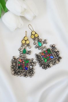 Afghan Jewellery Authentic Traditional Handmade Earrings. Get in contact with us if there is any queries regarding the item. Check out my page for other items. Help my small business and promote Afghan culture by placing an order with us. We have different kinds and types of Afghan Vintage Jewelleries! Your feedback is much appreciated. Please let us know the item arrived safely! Multicolor Traditional Jewelry For Vintage Collection, Festive Vintage Chandbali Danglers, Traditional Meenakari Earrings For Festivals, Bohemian Earrings With Mirror Work For Festive Occasions, Bohemian Chandbali Danglers With Mirror Work, Bohemian Chandbali Earrings With Mirror Work, Handmade Vintage Chandbali Danglers, Multicolor Earrings With Mirror Work For Festivals, Vintage Danglers With Latkans For Festive Season