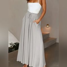 These Plus Size, Lace-Up, Wide-Leg Pants Are Perf For Spring And Summer. The Lace-Up Front Is A Stylish Touch, And The Pants Are Loose And Comfy. Throw On A Tank Top, T-Shirt, Or Blouse, And You're Ready To Take On The Day. Gray Lace Up Wide Leg Pants Casual Loose Pants For Spring & Summer, Women's Plus Size Size Oxl/12 Waist: 33.9-36.2inhips: 43.7-46.1in Bottom Length 40 Inseam 27.5 Color Gray Material: Polyester Style: Vacation Operation Instruction: Machine Wash Or Professional Dry Clean Seas