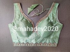 Mint Green Designer Blouse For Womens Girls Sabyasachi Deep V neck Saree Blouse Readymade Indian Beads Trim Work Blouse Bridesmaids Tees Choli gift Top PRODUCT DETAILS Auction For: 1 blouse Condition: New Work: Beads Trim work Washing Instructions: Dry Clean Only Occasions: Wedding Wear, Party Wear, Festive Wear, Durga Puja, Indian Wear, Sangeet Wear, Bridal Wear, Chrismas Day, Mothers Day, Haldi Wear. NOTE *Actual color may vary slightly from your monitor. *We dispatch the product within 5 days Elegant Designer Pista Green Blouse, Elegant Embroidered Pista Green Blouse, Elegant Pista Green Designer Blouse, Embellished Blouse For Festive Transitional Season, Transitional Festive Embellished Blouse, Traditional Embellished Blouse For Transitional Season, Green Embellished Top For Wedding, Embellished Green Top For Wedding, Pista Green Embellished Blouse Piece For Party