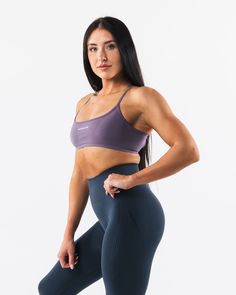 HIGHLIGHTS. Seamless construction Rib bra band for support Low to Medium impact Moisture-wicking breathable fabric Flattering scoop neckline A/B cup size FIT SUGGESTION. This item runs true to Alphalete's standard seamless fit.. We recommend sizing up for a comfortable fit.. Brooke is 5’5”/165cm, wearing a size S with a 35”/88.9cm bust. MATERIALS AND WASHING DIRECTIONS. 51% Polyamide, 38% Polyester, 11% Elastane. We recommend washing inside-out on a cold setting. Hang to dry DESCRIPTION With the B Cup, Cup Size, Scoop Neckline, Moisture Wicking, Breathable Fabric, Inside Out, Comfort Fit, Yarn, Bra